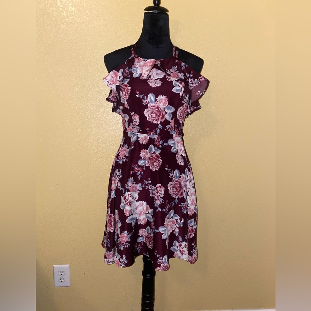 A dress from blue rain size small burgundy with flowers